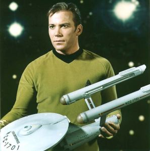 USS_Enterprise_three_foot_model_held_by_William_Shatner